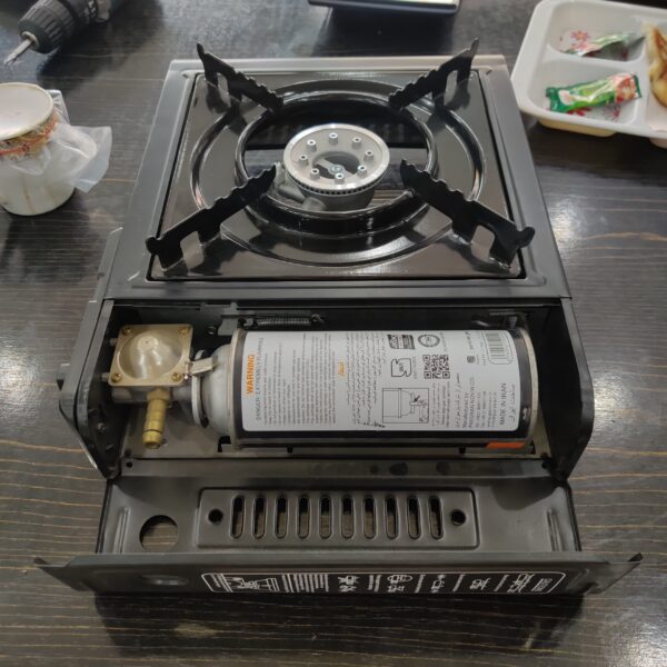 Portable and foldable gas stove ideal for camping, hiking, and outdoor cooking. Lightweight, durable, and compatible with standard gas canisters. Compact size and windproof flame make it perfect for travel use. - Image 4